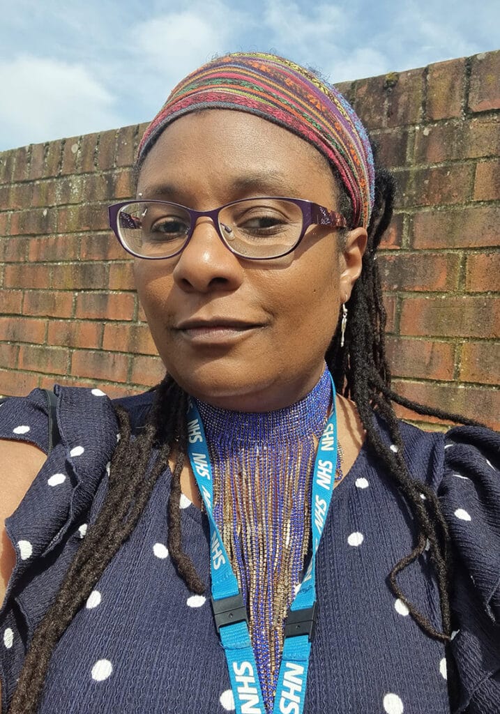 Photo of Andrea Knowles wearing NHS lanyard